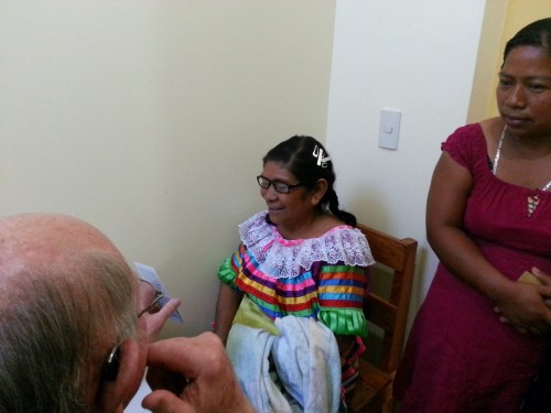 A Tzeltal patient receives a vision test