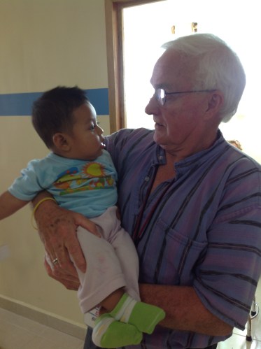 Dr. Bill with a young patient